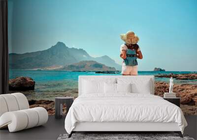 Tourism, travel, vacation on the rocky sea. Wall mural