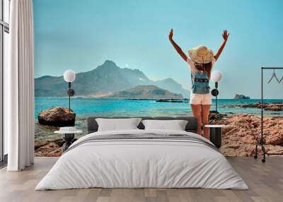 Tourism, travel, vacation on the rocky sea. Wall mural