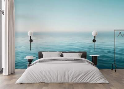 Minimalist image of a peaceful ocean horizon under soft, calming light, perfect for tranquil and serene themes. Wall mural