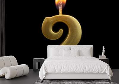 Burning birthday golden candle isolated on black background, number 2 Wall mural