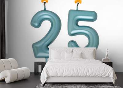 Burning blue birthday candles isolated on white background, number 25 Wall mural