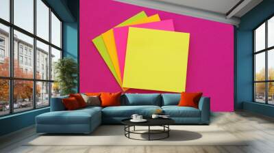 Many colores paper stickers on pink background Wall mural