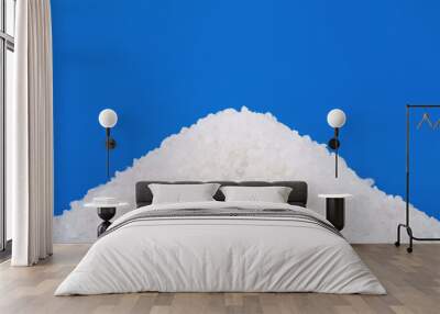 Sea salt heap on blue background Wall mural