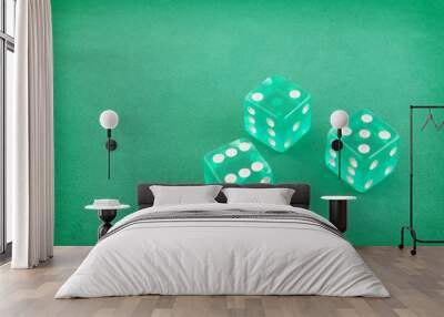 Three dices on green gaming table, gambling concept Wall mural