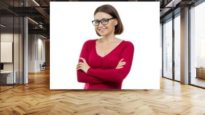 Portrait of mature smiling woman with glasses with arms crossed, white background isolated Wall mural