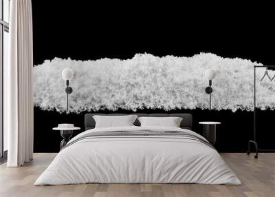 pile of white snow isolated on black background Wall mural