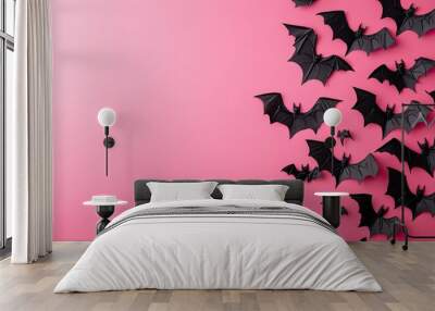 Bright pink background with smiling bat designs Wall mural