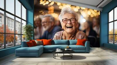 Cheerful facial expressions, old aged lady woman having fun, living active full life concept. Happy funny cheerful senior female smiling into camera. Sitting people on background Wall mural