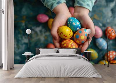 Child toddler kid holding colored Easter eggs in closeup hands. Religious holidays celebrating special moment to color decorate eggs tradition concept. Spring holiday celebration concept Wall mural