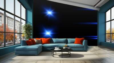 The effect of abstract blue light rays with highlights on a black background. Vector 10 EPS Wall mural