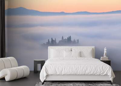 Amazing scenery view of Tuscany countryside in morning fog. Rural landscape. Italy, Podere Belvedere. Wall mural