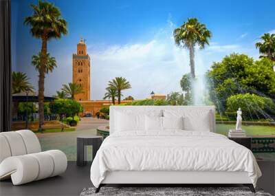 Cityscape with beautiful fountain in park. View of Koutoubia Mosque. Marrakesh, Morocco, North Africa Wall mural