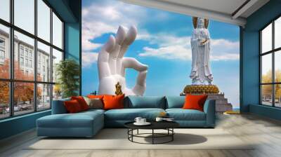 White GuanYin statue in Nanshan Buddhist Cultural Park, Sanya, Hainan Island, China. Wall mural