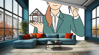 Smiling realtor hold house miniature and key Wall mural