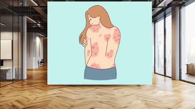 Unhealthy woman show red rash on back Wall mural