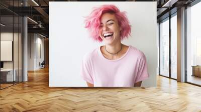 young laughing woman with pastel pink hair, tongue sticking out, blue eyes, peace gestures funny facial expressions Wall mural