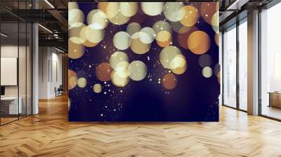 Blue bokeh background with golden glitter particles. Gold confetti. Luxury beautiful festive shining background. Glow light effect on dark. Party invitation card template, design element Wall mural