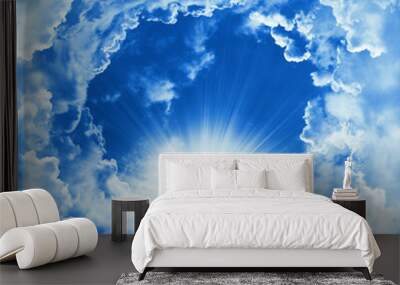 Religion concept of heavenly background. Divine shining heaven with dramatic clouds, light. Sky with beautiful cloud and sunshine. Sunny day. Peaceful nature sky background Wall mural