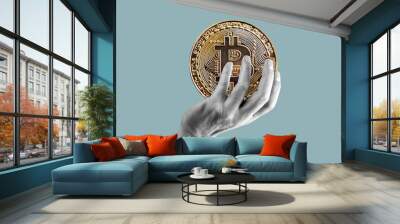 Hand holding bitcoin coin. Crypto currency, digital money, finance concept. Contemporary art collage. Wall mural