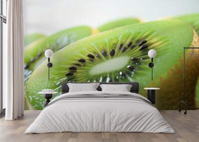 juicy kiwis on a clean, bright white background. The focus is on the vibrant green flesh and the detailed texture of the kiwi skin, with even lighting that highlights their Wall mural