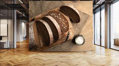 Freshly baked grain brown bread close up still life Wall mural