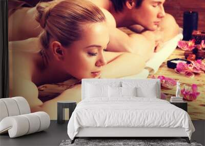 Attractive couple relax at the spa salon. Wall mural