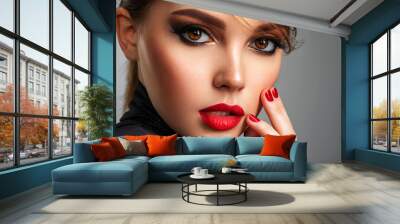 Beautiful brunette girl with red lips and short hair. Pretty young sensual woman with red nails. Closeup portrait of a model with bright makeup on a face. Attractive female posing at studio. Wall mural