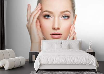 Beautiful face of young woman with perfect health  skin Wall mural