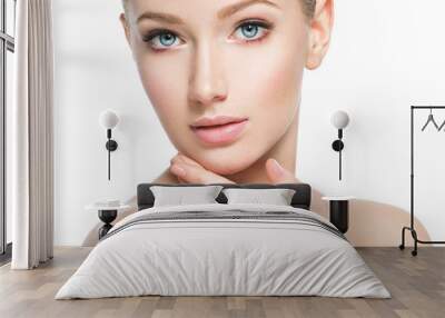 Beautiful face of young woman with perfect health  skin Wall mural