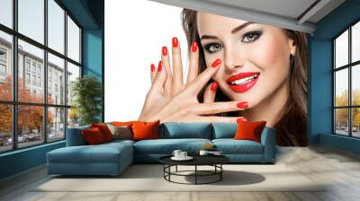 beautiful smiling woman with red nails Wall mural