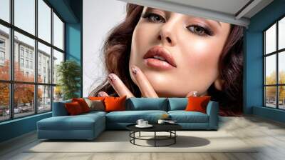 Beautiful woman with brown hair. Beautiful face of an attractive model with fashion makeup. Portrait of a beautiful woman with a long hair. Beautiful woman with a sexy slim body.   Fashion model. . Wall mural