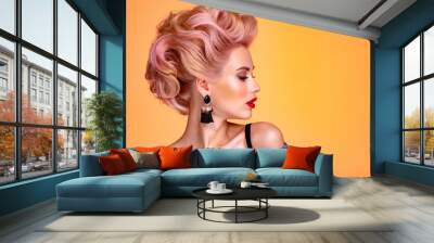 Beautiful woman with creative hairstyle, vivid makeup. Fashionable girl. Beautiful face of young woman with red lips. Stunning blonde girl. Bright eye makeup. Attractive caucasian model with earrings Wall mural