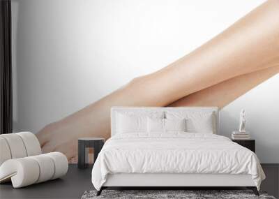 Beautiful women feet isolated on white. Close-up. Wall mural