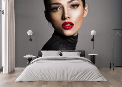 Beautiful young fashion woman with red lipstick. Wall mural