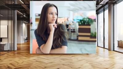 Beautiful young sexy woman with long brown hair. Wall mural