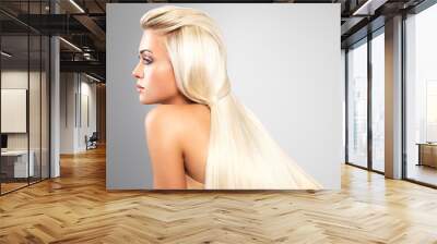 Blond woman with long straight hair Wall mural