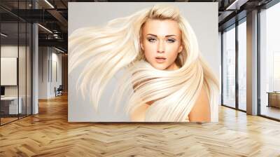 Blond woman with long straight hair Wall mural