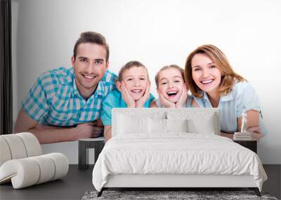 caucasian happy smiling young family with two children Wall mural