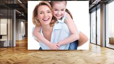 Closeup portrait of happy mother and young daughter Wall mural