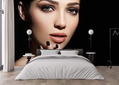 Face of a beautiful girl with fashion makeup and black nails Wall mural