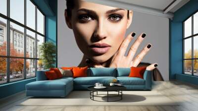 Face of a beautiful girl with fashion makeup and black nails Wall mural