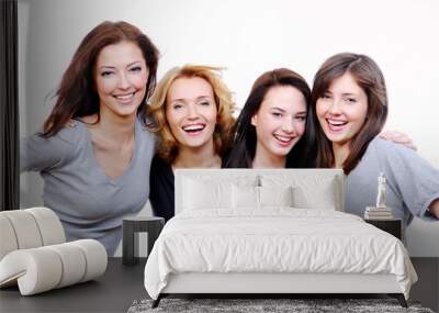 four sexy, beautiful young happy women Wall mural