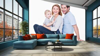 Happy young family with little child. Wall mural