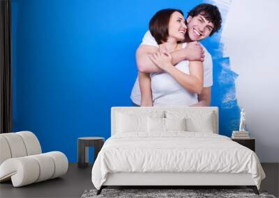 loving couple near the painted wall Wall mural