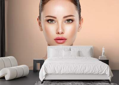 Portrait of beautiful  girl which touching her fresh face.  Closeup face of young woman with clean skin. Skin care. Wall mural