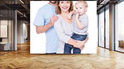 Portrait of the happy family with little baby. Wall mural