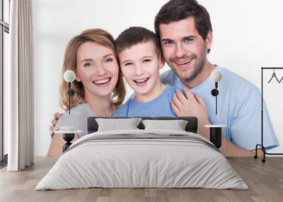 Portrait of the happy parents with son looking at camera - isolated on white background Wall mural