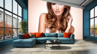 Pretty woman with beautiful long brown hair Wall mural