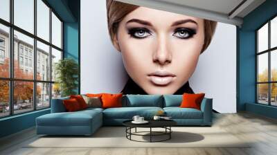 Woman's face with  fashion black makeup of eye and long black eyelashes. Wall mural