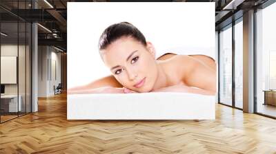 Woman relaxing in spa salon Wall mural